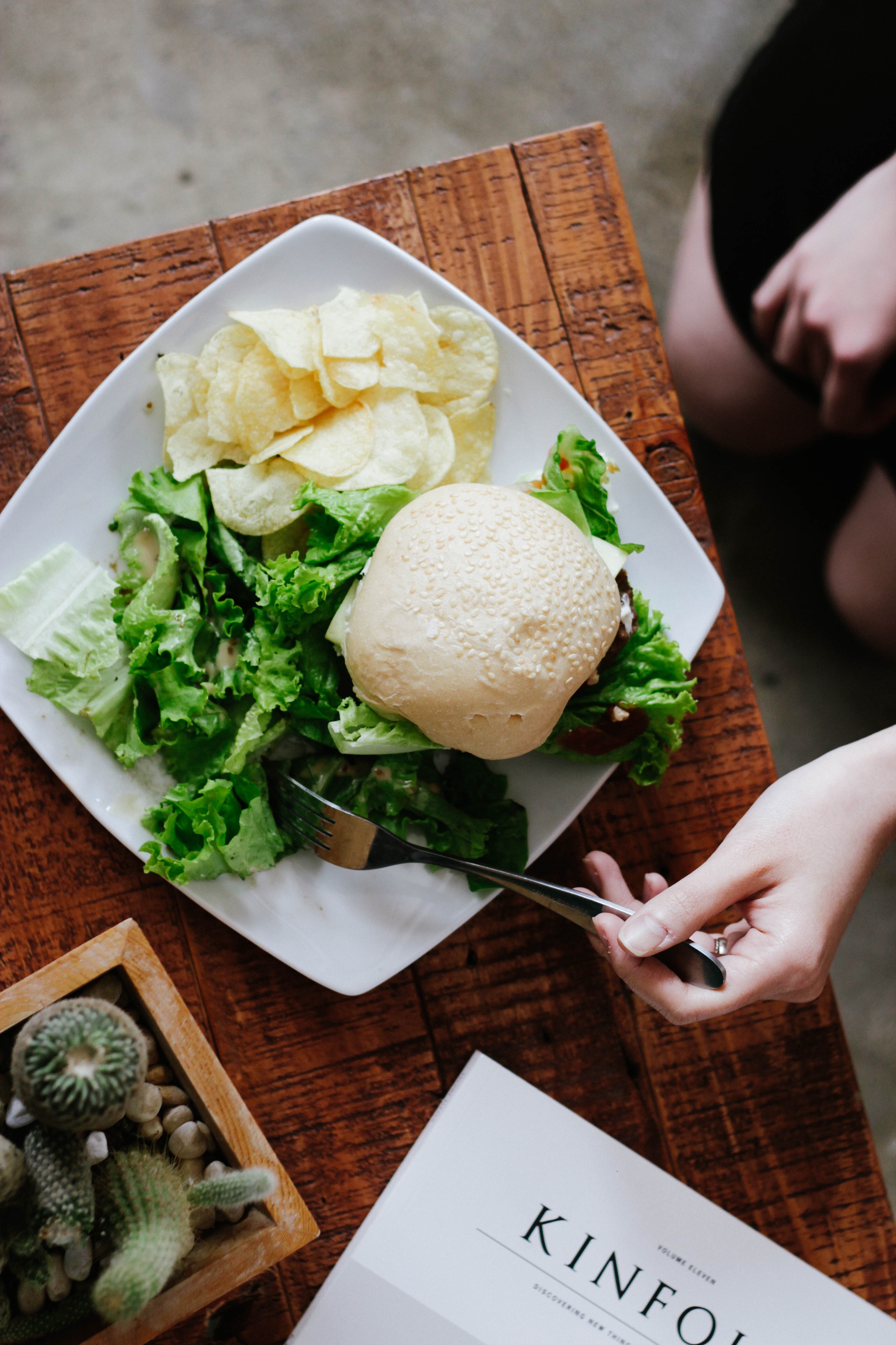 Woman eating lunch with romaine lettuce