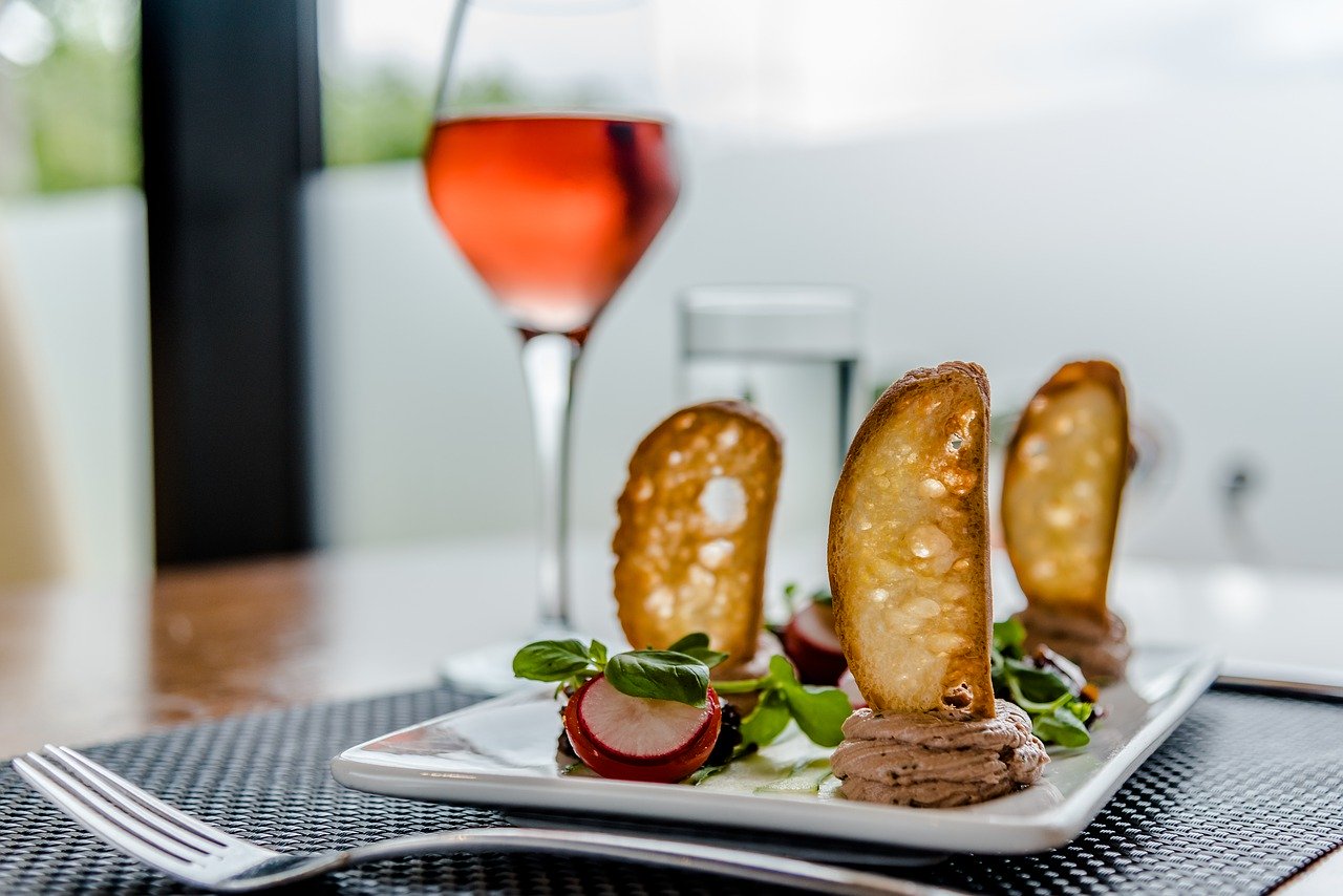 Food with a glass of wine at Rediviva